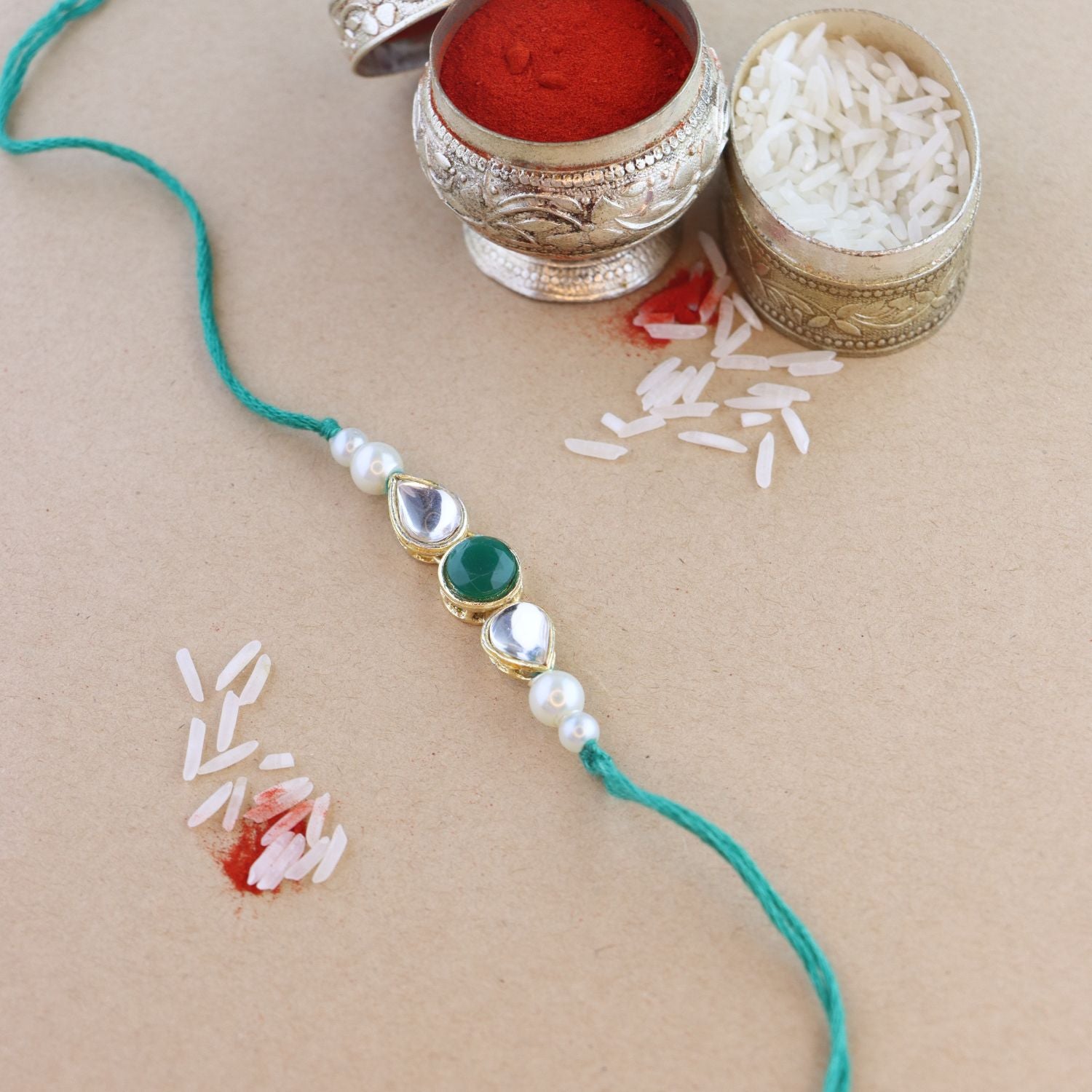 Dazzling Pearl Kundan Stone Rakhi with Roli Chawal & Card