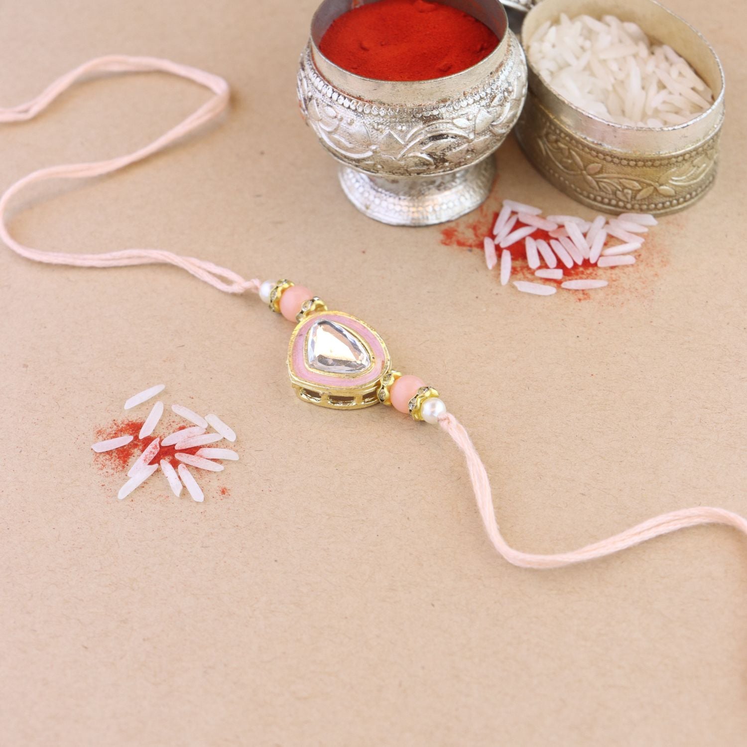 Dazzling Pearl Kundan Stone Rakhi with Roli Chawal & Card