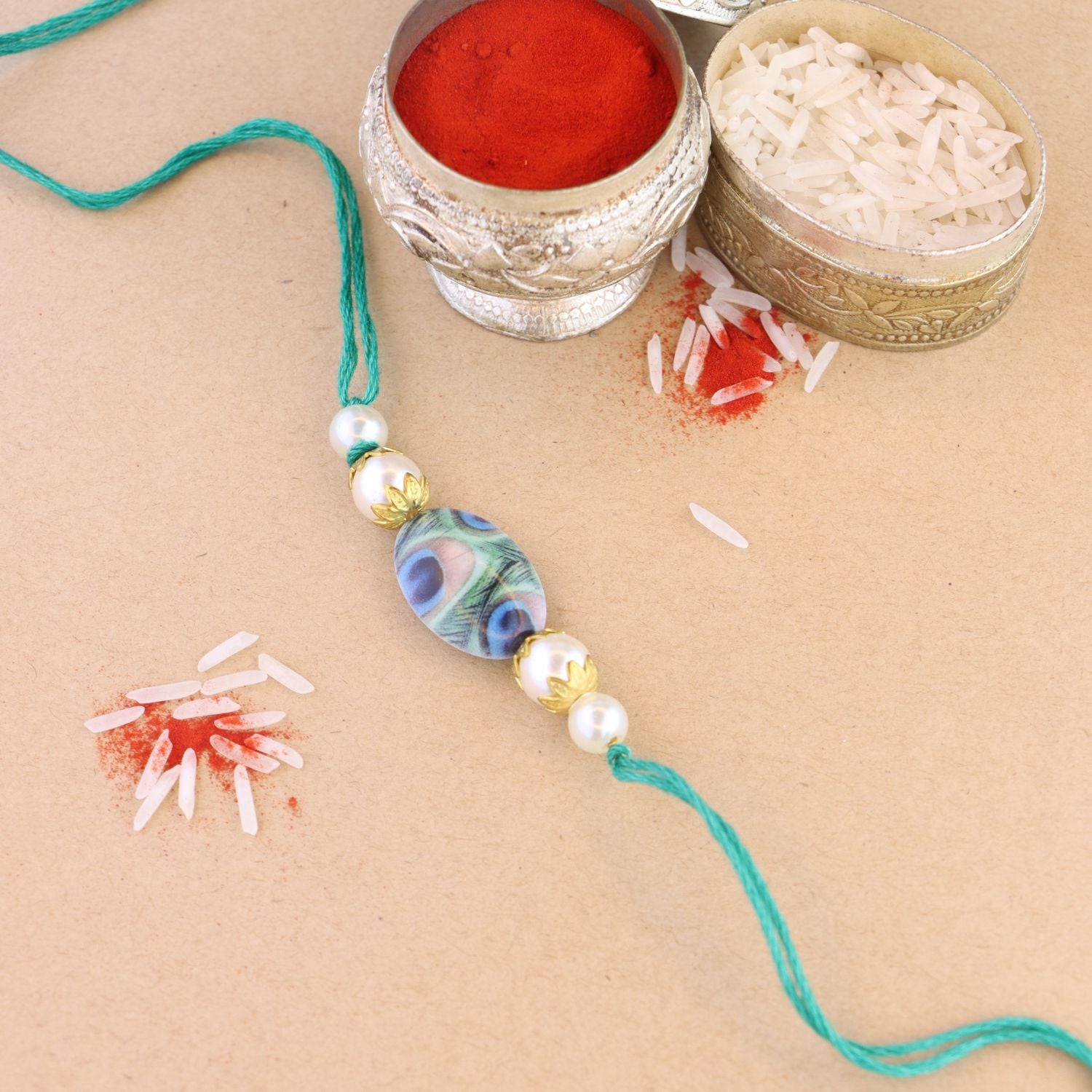 Beautiful Peacock Feather Rakhi with Roli Chawal & Card