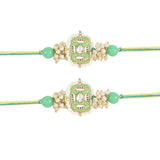 Mesmerizing Kundan And Meena Rakhi With Roli Chawal & Card (Pack of 2)