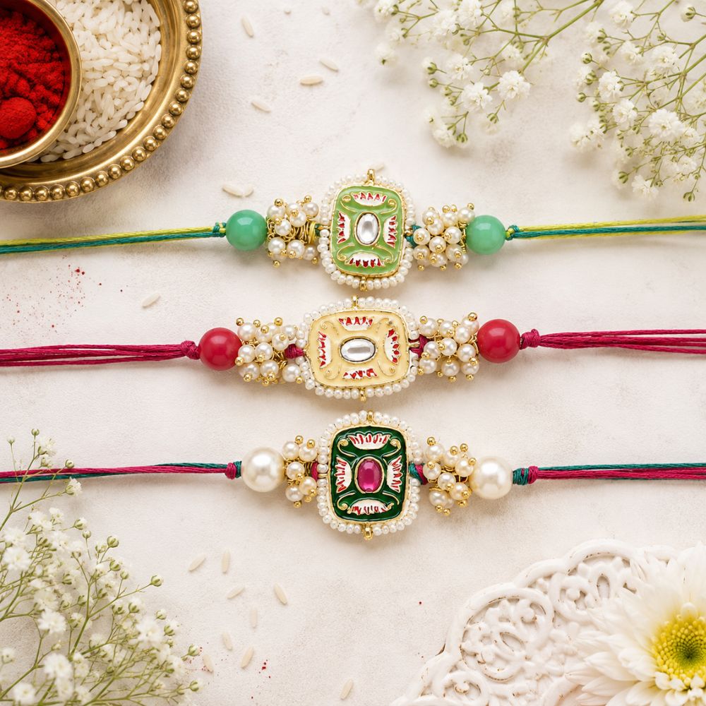 Mesmerizing Kundan And Meena Rakhi With Roli Chawal & Card (Pack of 3)