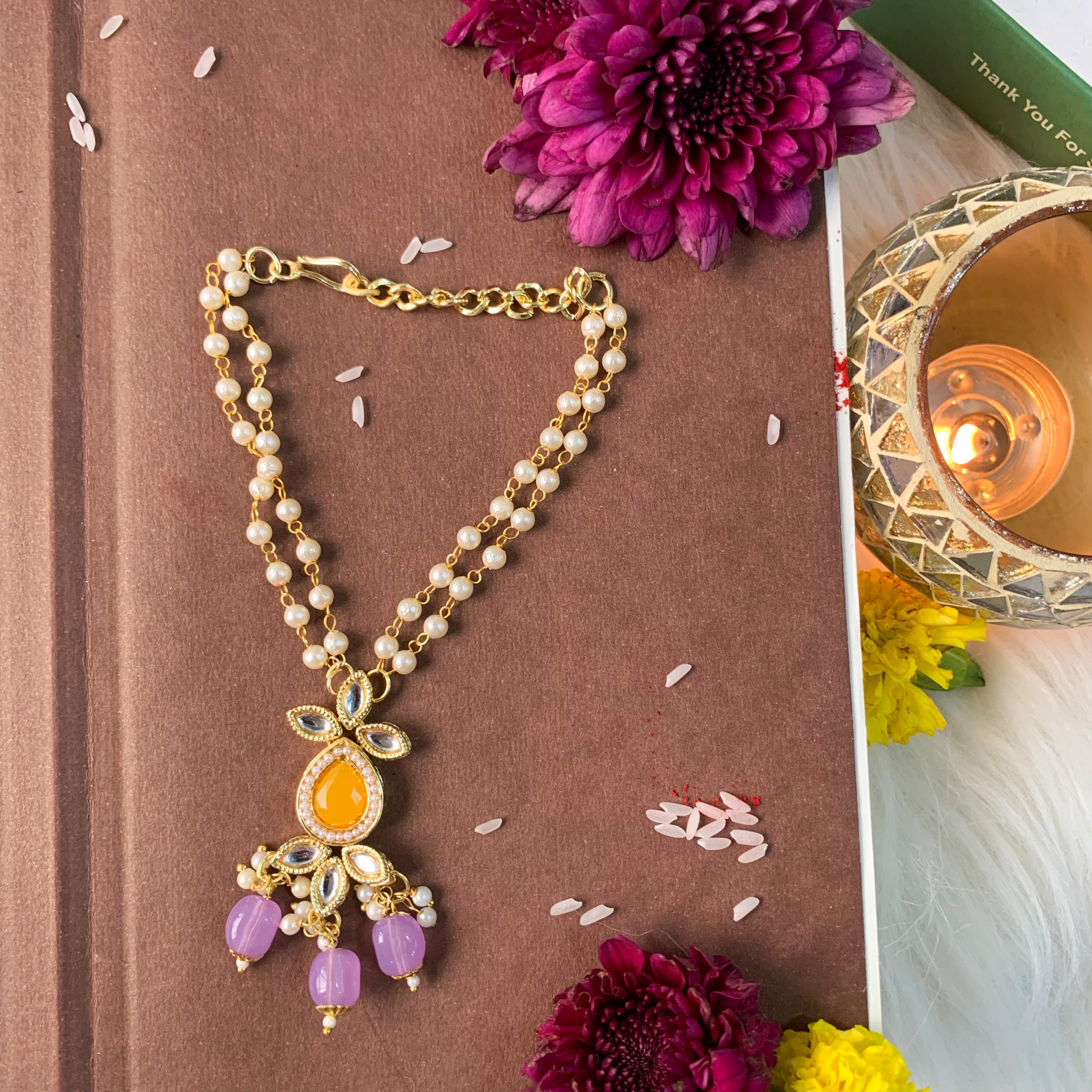Alluring Pearl & Kundan Lumba Rakhi
