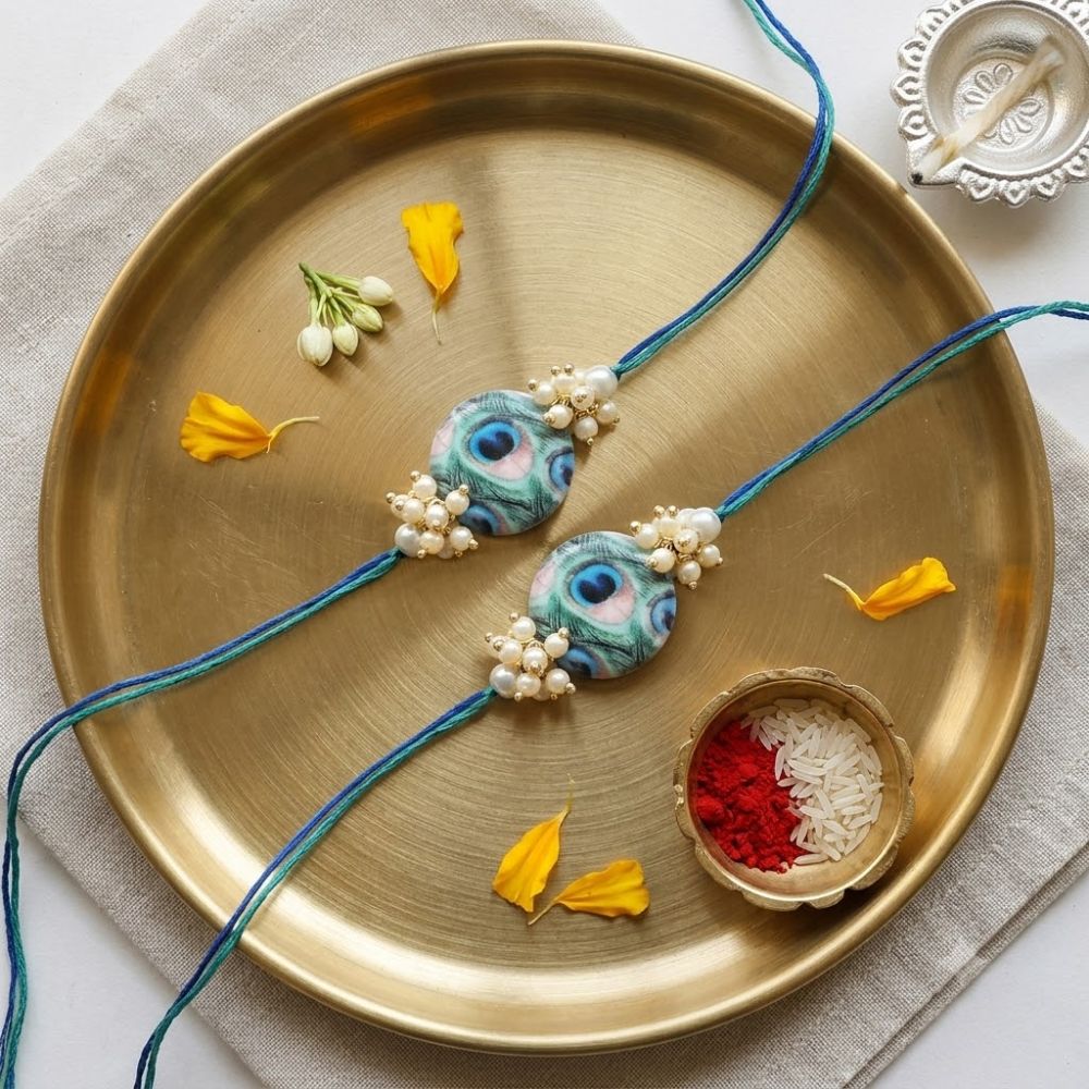 Beautiful Peacock Feather Rakhi with Roli Chawal & Card (Pack of 2