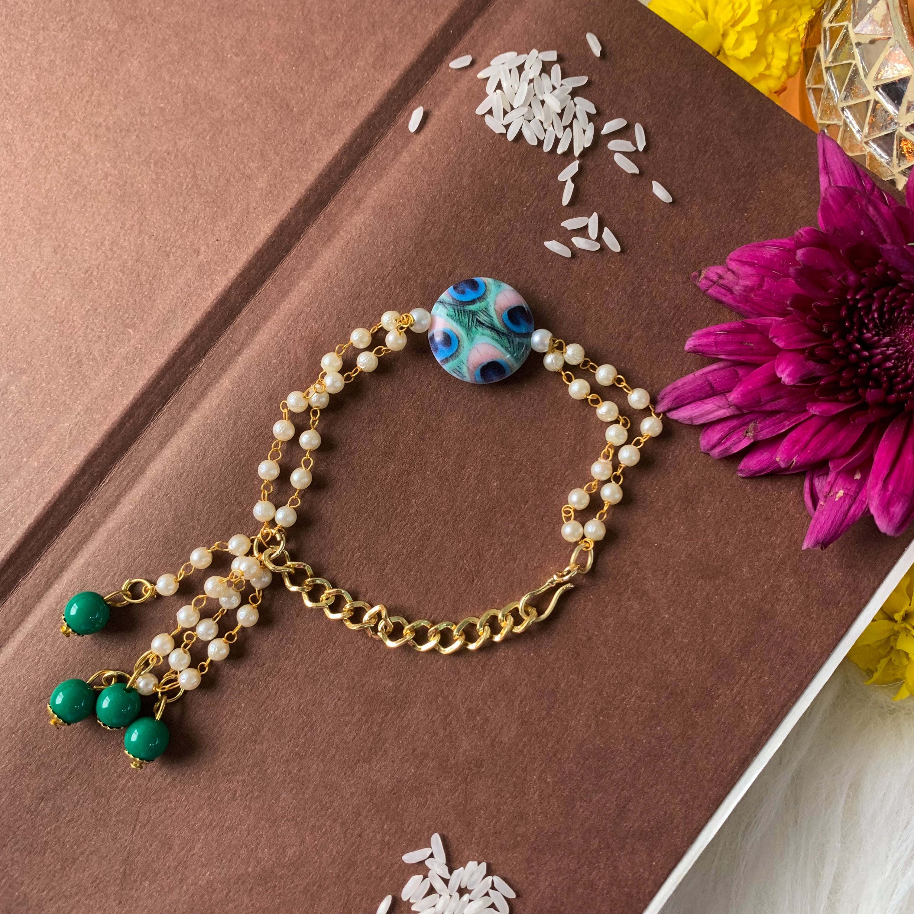 Alluring Pearl & Kundan Lumba Rakhi