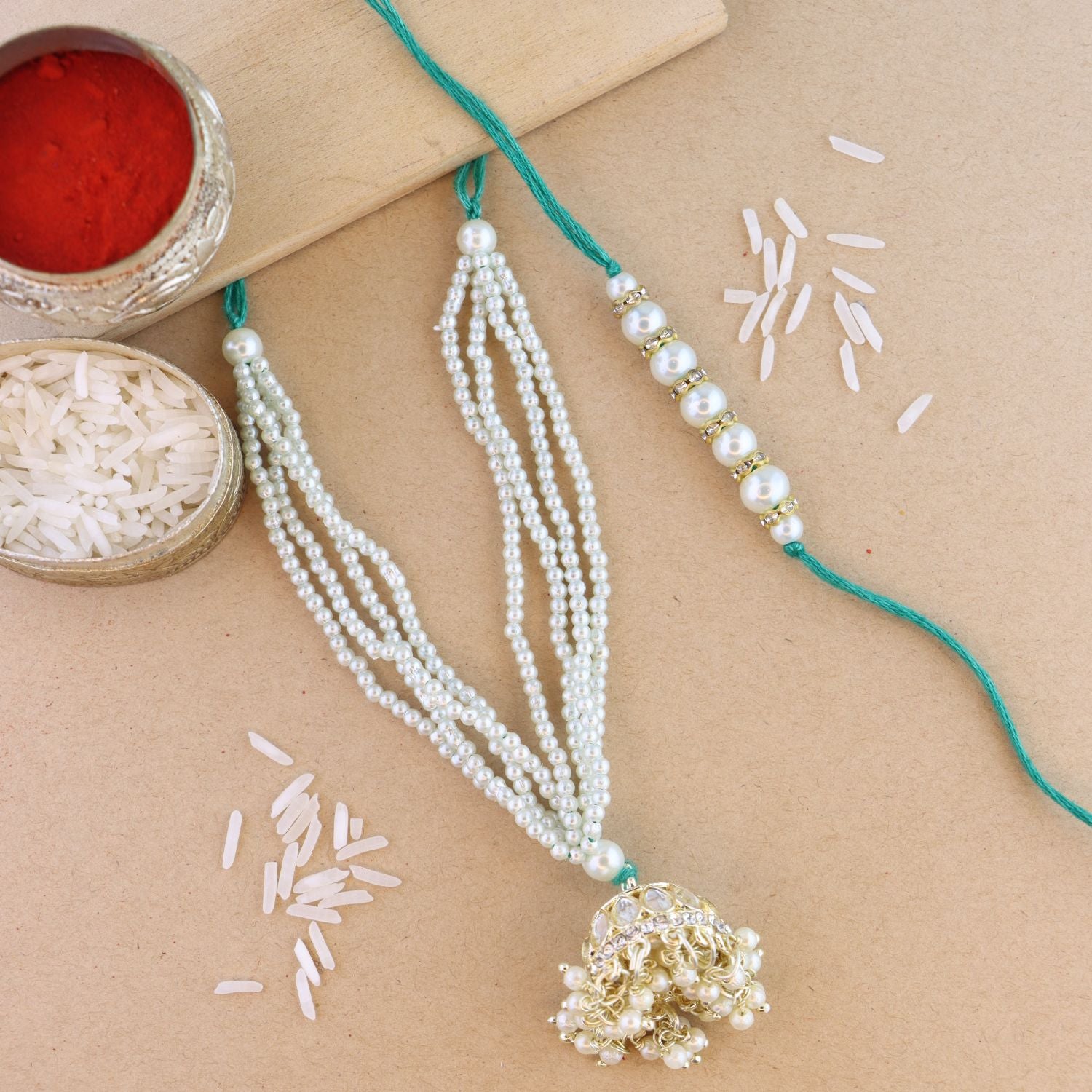 Elegant Bhaiya Bhabhi Lumba & Pearl Rakhi With Roli Chawal & Card