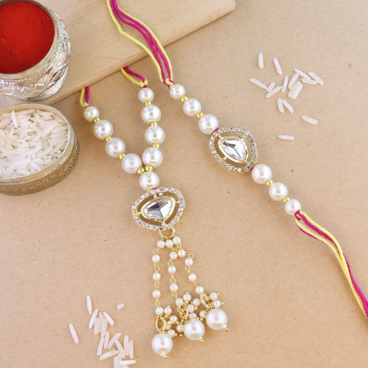 Elegant Bhaiya Bhabhi Lumba & Pearl Rakhi With Roli Chawal & Card
