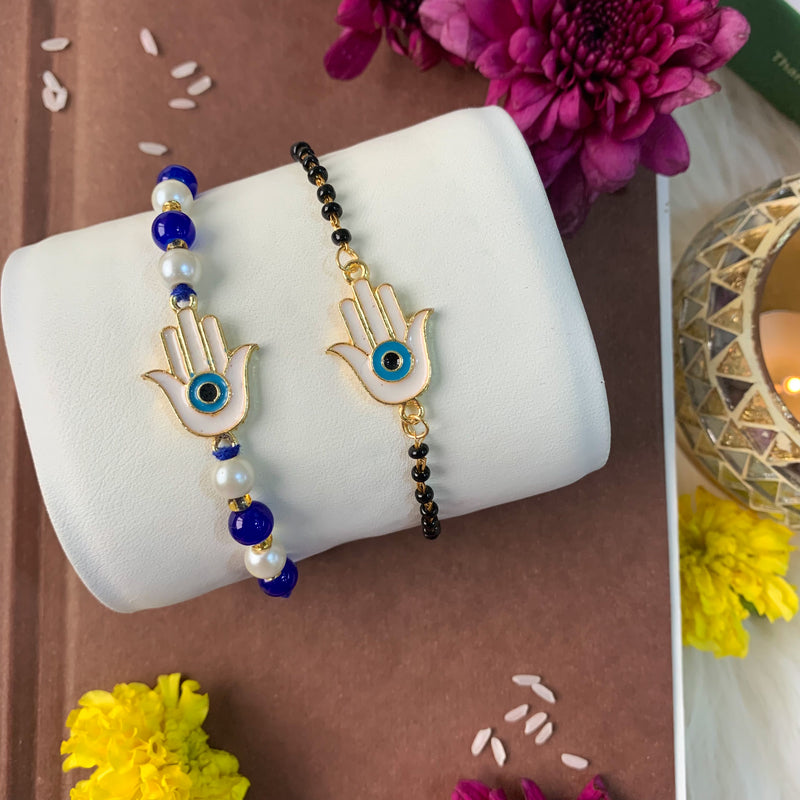 Buy Zeneme Gold Toned Blue Enamelled Oyster Hanging Artifical Stone Studded  Lumba Rakhi/ Bracelet for Bhabhi Online at Best Prices in India - JioMart.