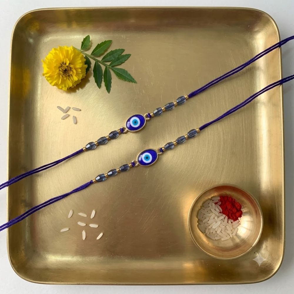Evil Eye Shape Bhaiya Rakhi With Roli Chawal & Card (Pack of 2)