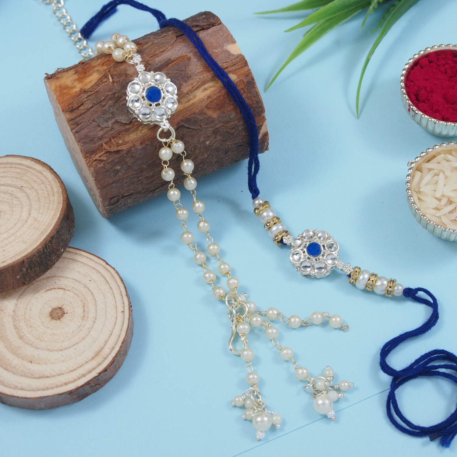 Elegant Bhaiya Bhabhi Lumba Pearl Blue Rakhi With Roli Chawal & Card