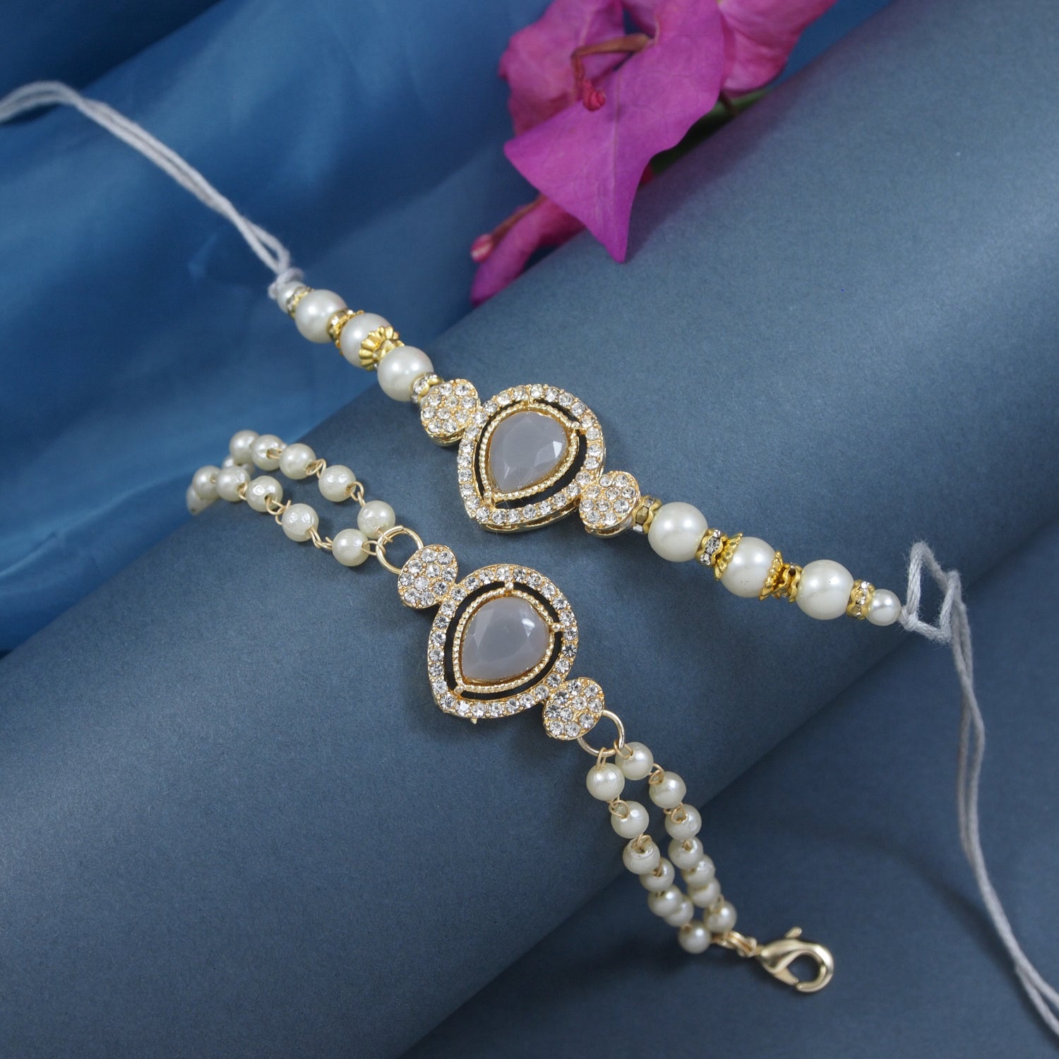 Elegant Bhaiya Bhabhi Grey Lumba & Pearl Rakhi With Roli Chawal &Card