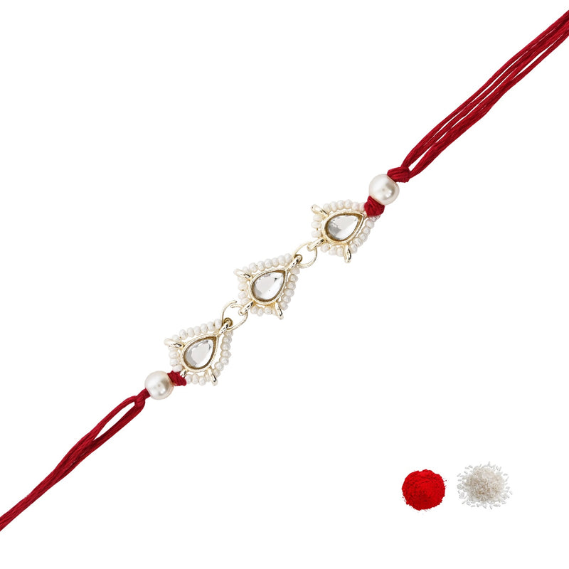 Delicate Pearl Beads Maroon Rakhi with Roli Chawal & Rakshabandhan Card