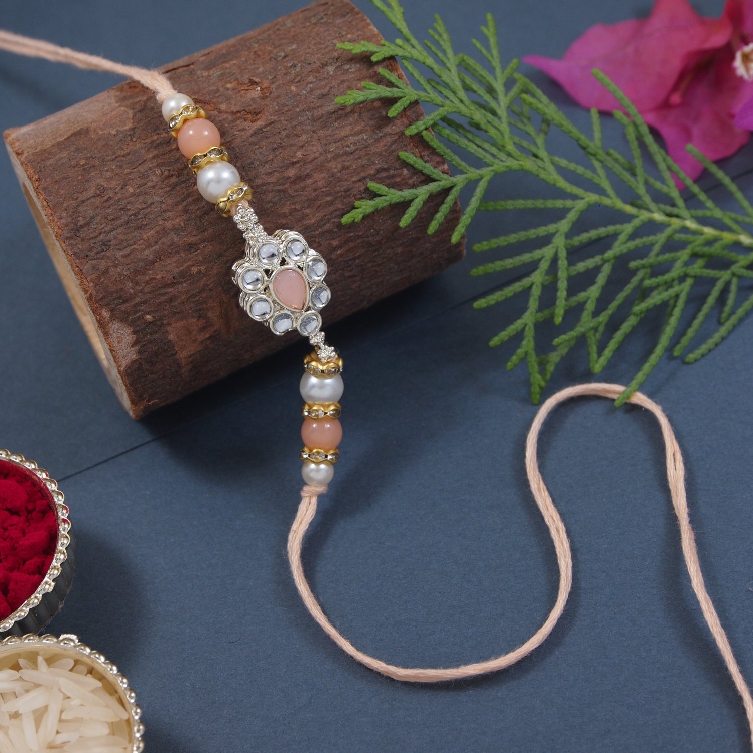 Delicate Pearl Beads Peach Rakhi with Roli Chawal & Rakshabandhan Card