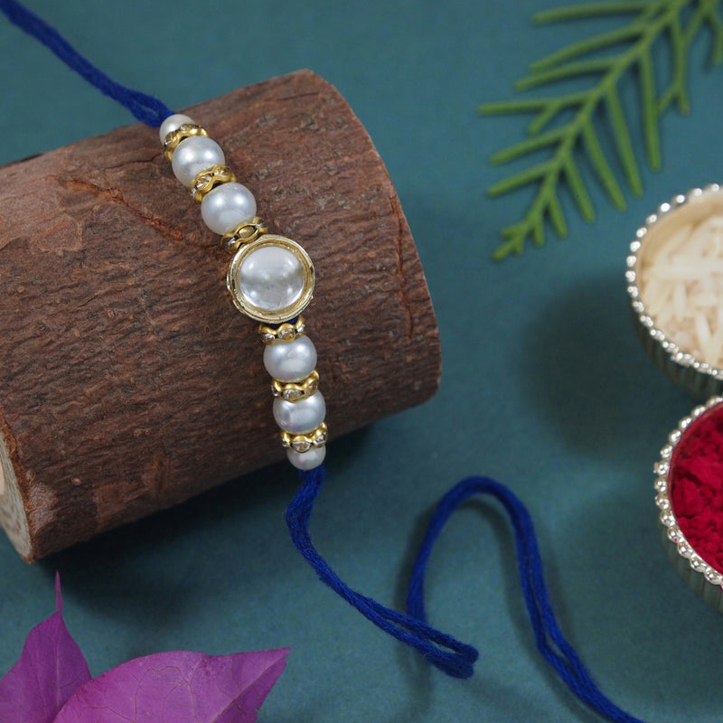 Delicate Pearl Beads Blue Rakhi with Roli Chawal & Rakshabandhan Card