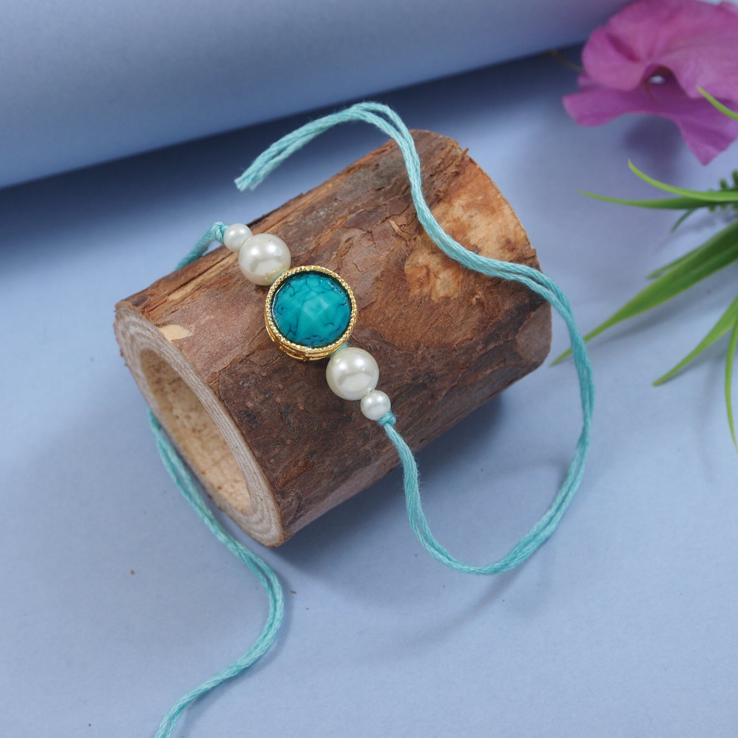 Delicate Pearl Beads Marble Finish Turquoise Rakhi with Roli Chawal & Rakshabandhan Card