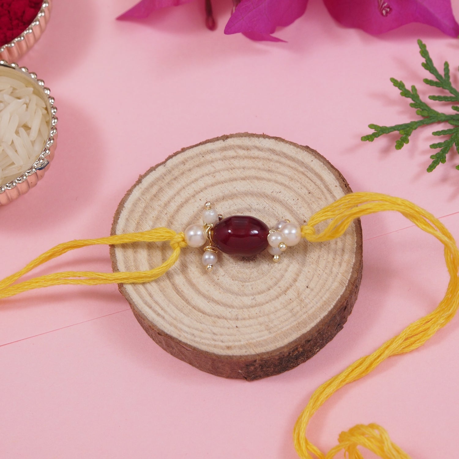 Delicate Pearl Beads Maroon Rakhi with Roli Chawal & Rakshabandhan Card