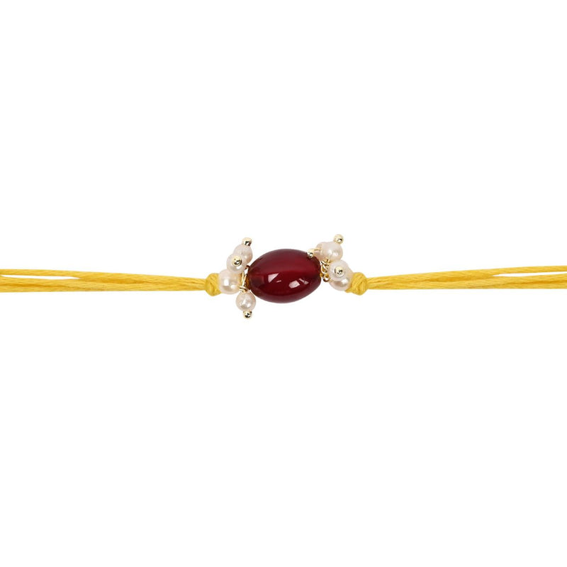 Delicate Pearl Beads Maroon Rakhi with Roli Chawal & Rakshabandhan Card
