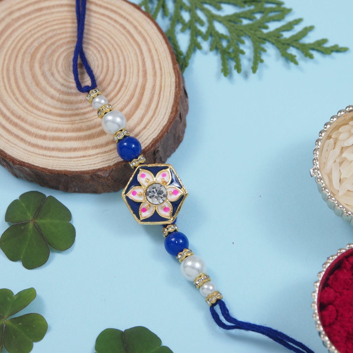 Delicate Pearl Beads Blue Rakhi with Roli Chawal & Rakshabandhan Card