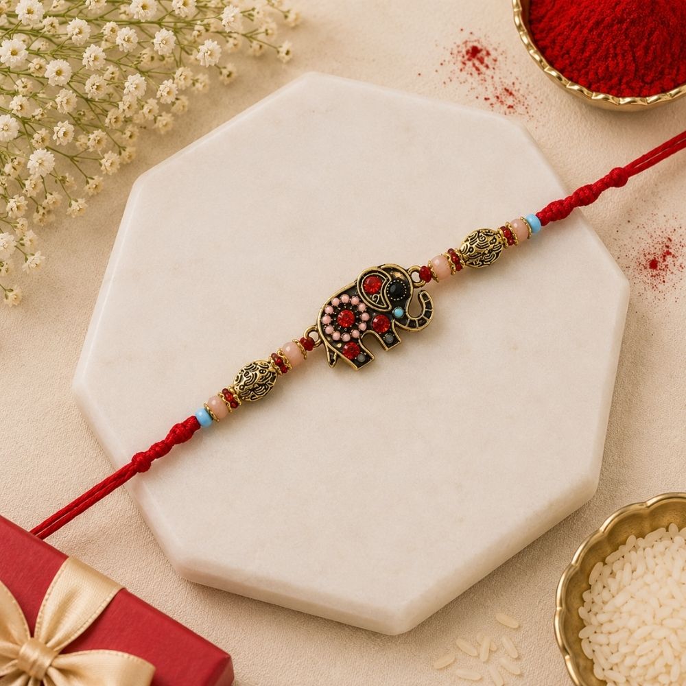DELICATE PEARL BEADED Elephant RAKHI WITH ROLI CHAWAL & RAKSHABANDHAN CARD