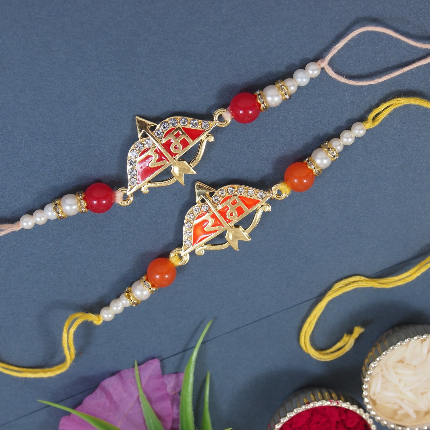 (Pack Of 2) Jai Shree Ram Orange & Red Arrow Rakhi