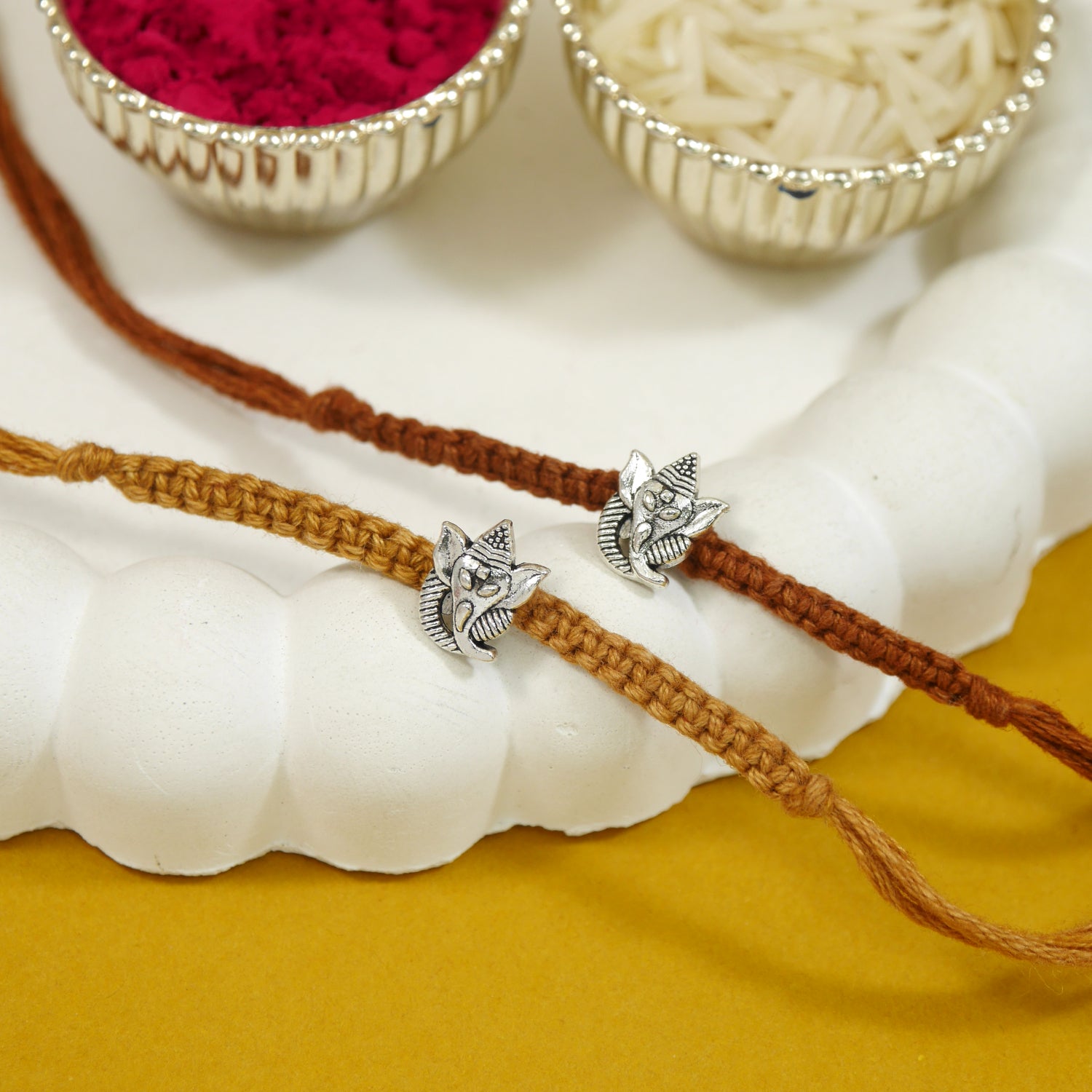 Ganesha Rakhi With Roli Chawal & Rakshabandhan Card (Pack of 2)
