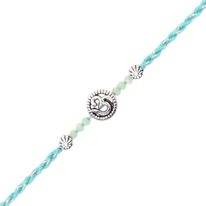Elegant Om Rakhi with Mint Green Beads