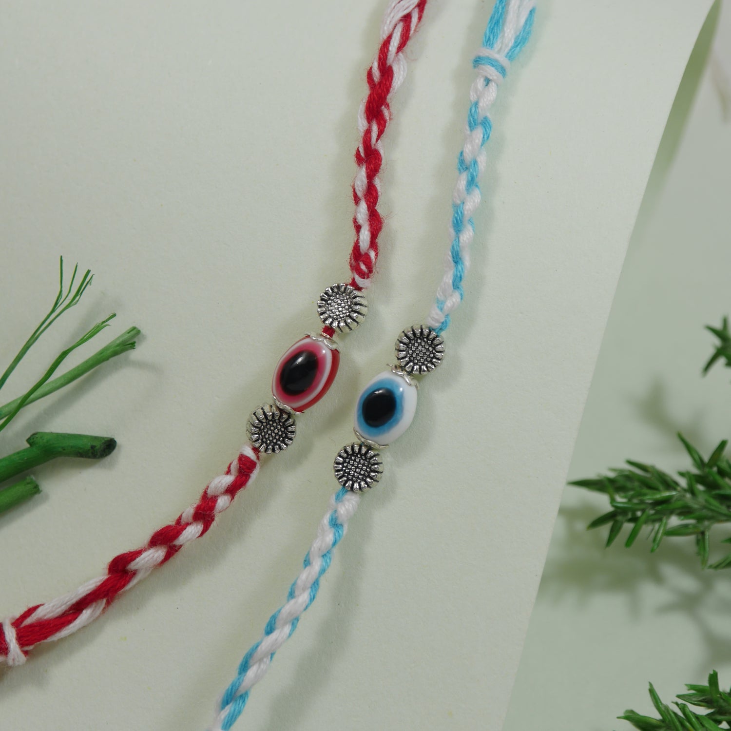 Enamel Evil Eye Rakhi With Roli Chawal & Rakshabandhan Card (Pack of 2)