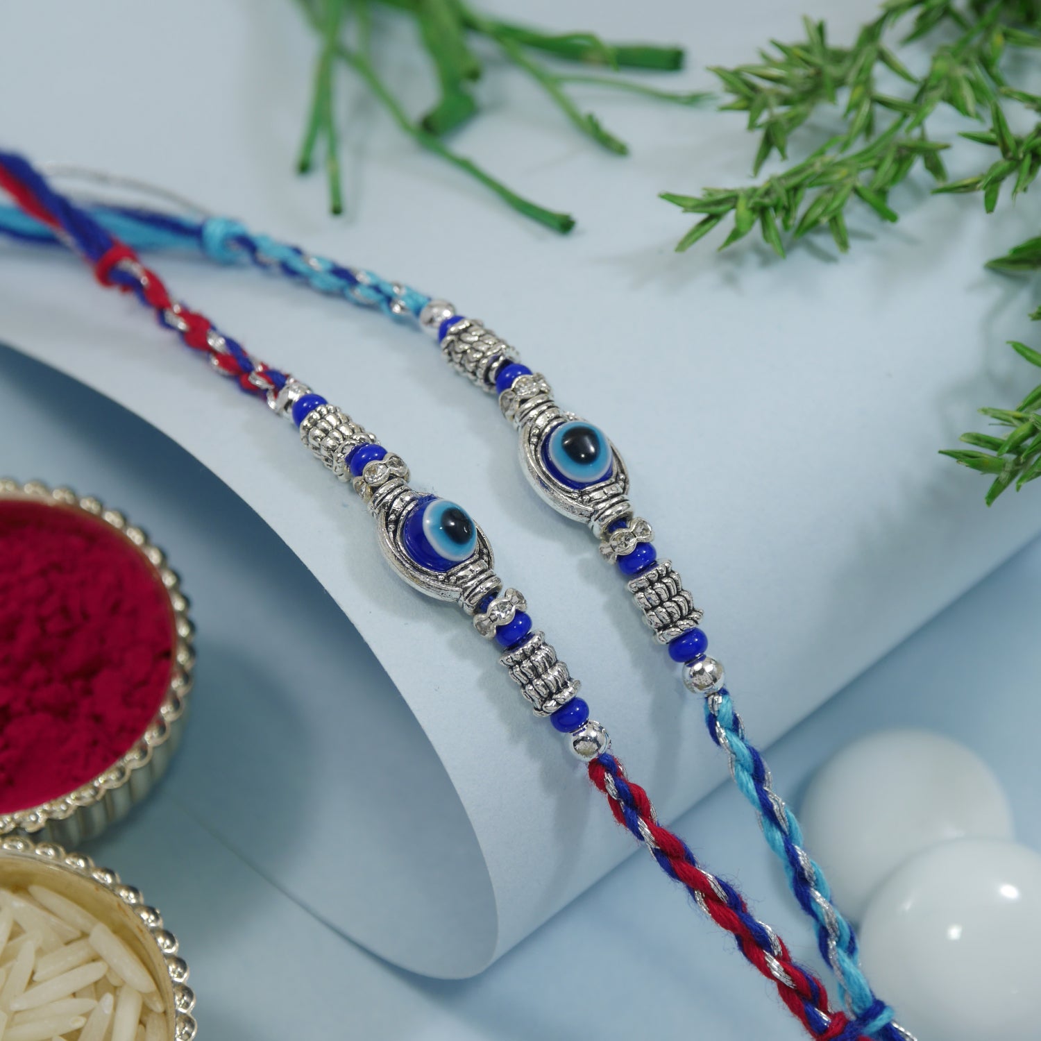 Evil Eye Rakhi Set with Roli Chawal & Rakshabandhan Card (Pack of 2)