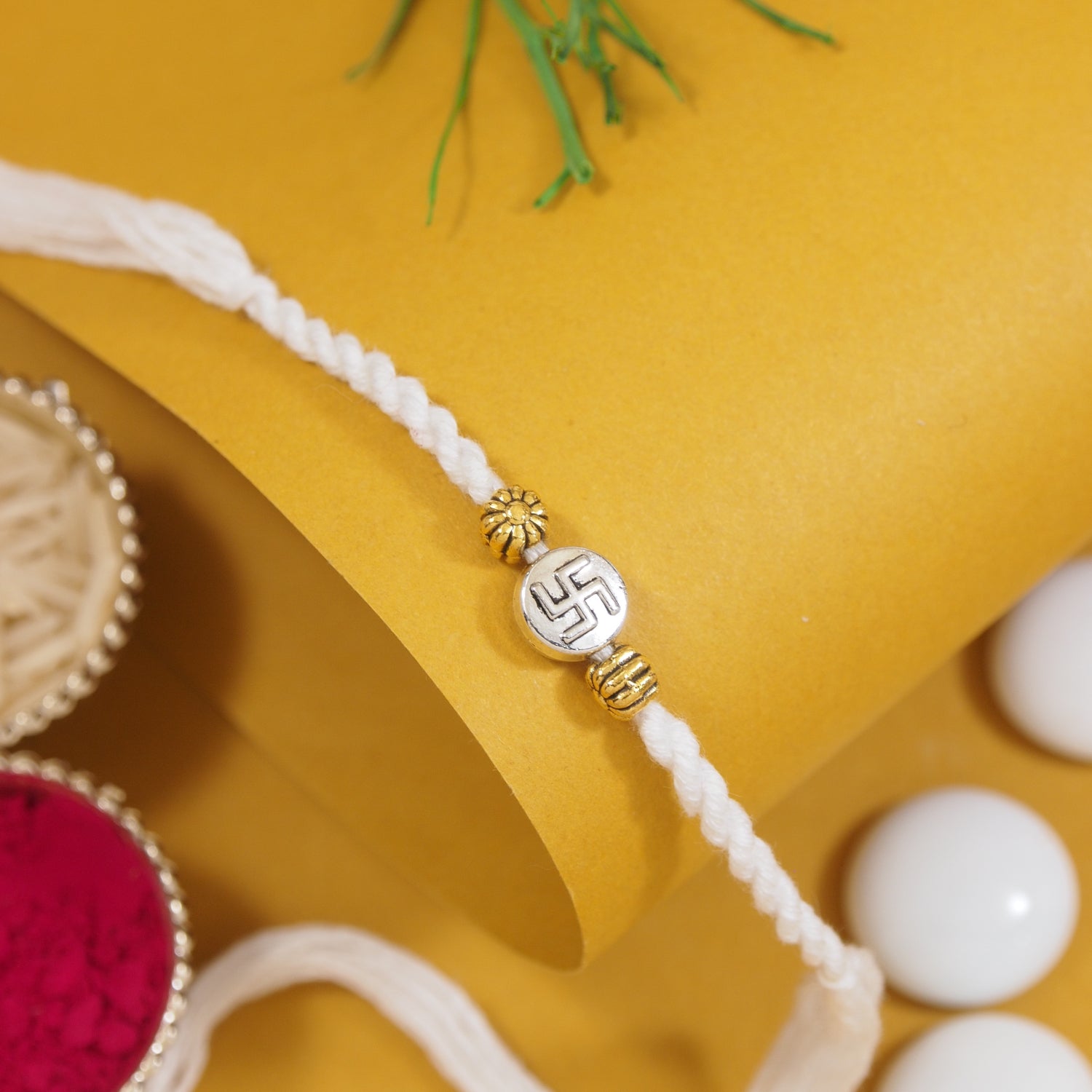 Swastik White Rakhi for Brother with Roli Chawal & Raksha Bandhan Card