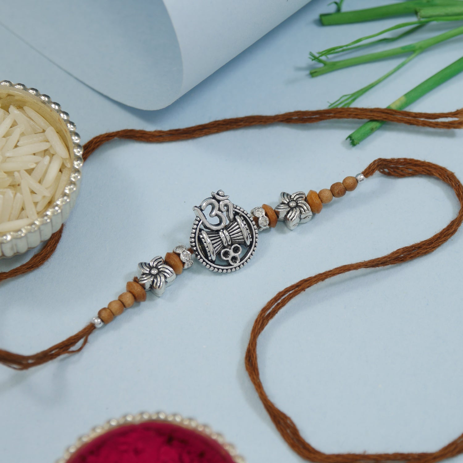 Rudra Om Damru Brown Rakhi with Roli Chawal & Rakshabhandan Card