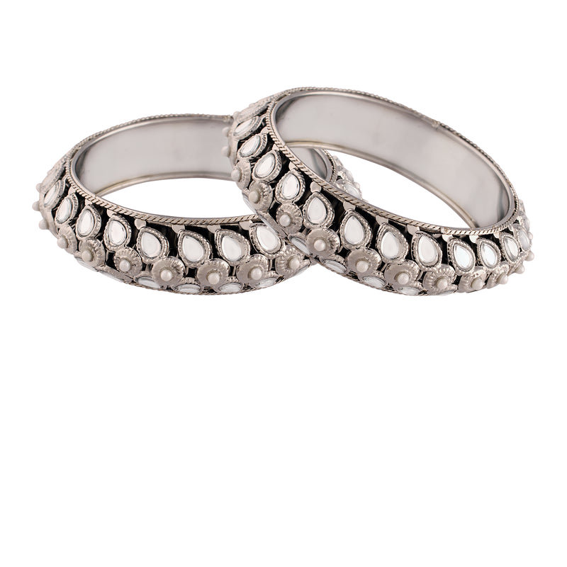 pearls , kundan , studed bangles 