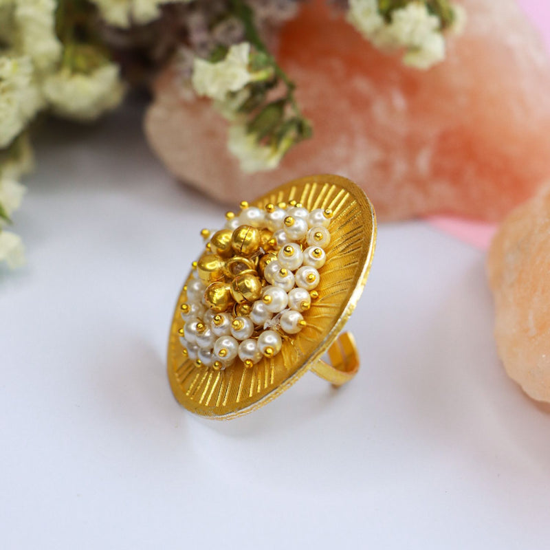 gold ghungroo , pearls , finger ring 