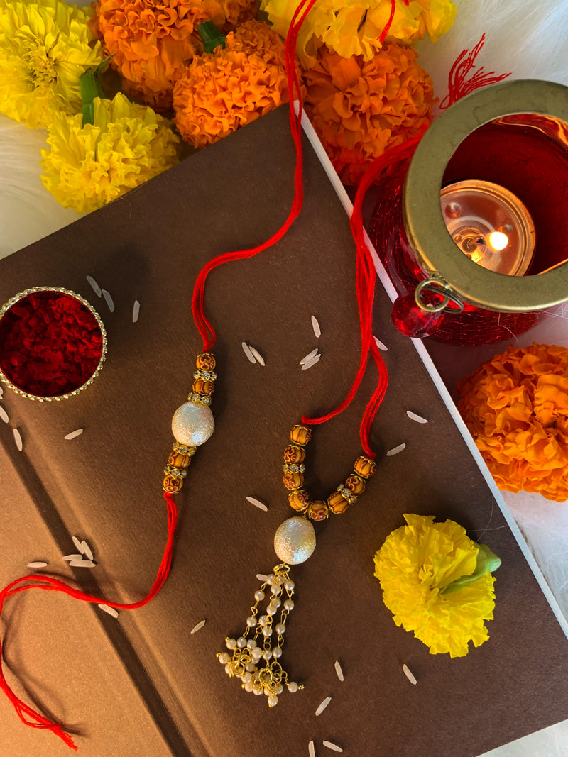 Charming Pearls And Beads Rakhi with Roli Chawal