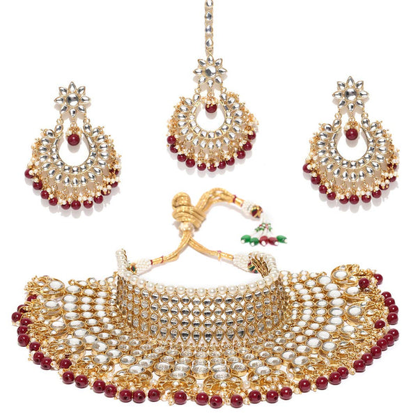 kundan , stones , pearls , jewellery set