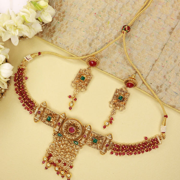 stones, kundan , gold , pearls , jewellery set