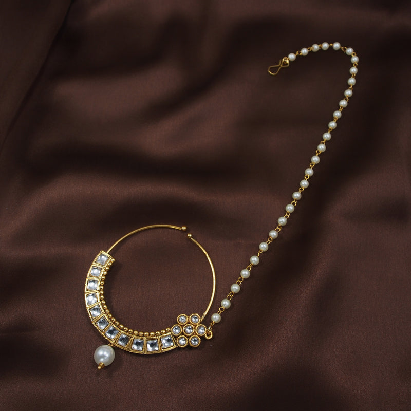 kundan , pearls , nose ring 
