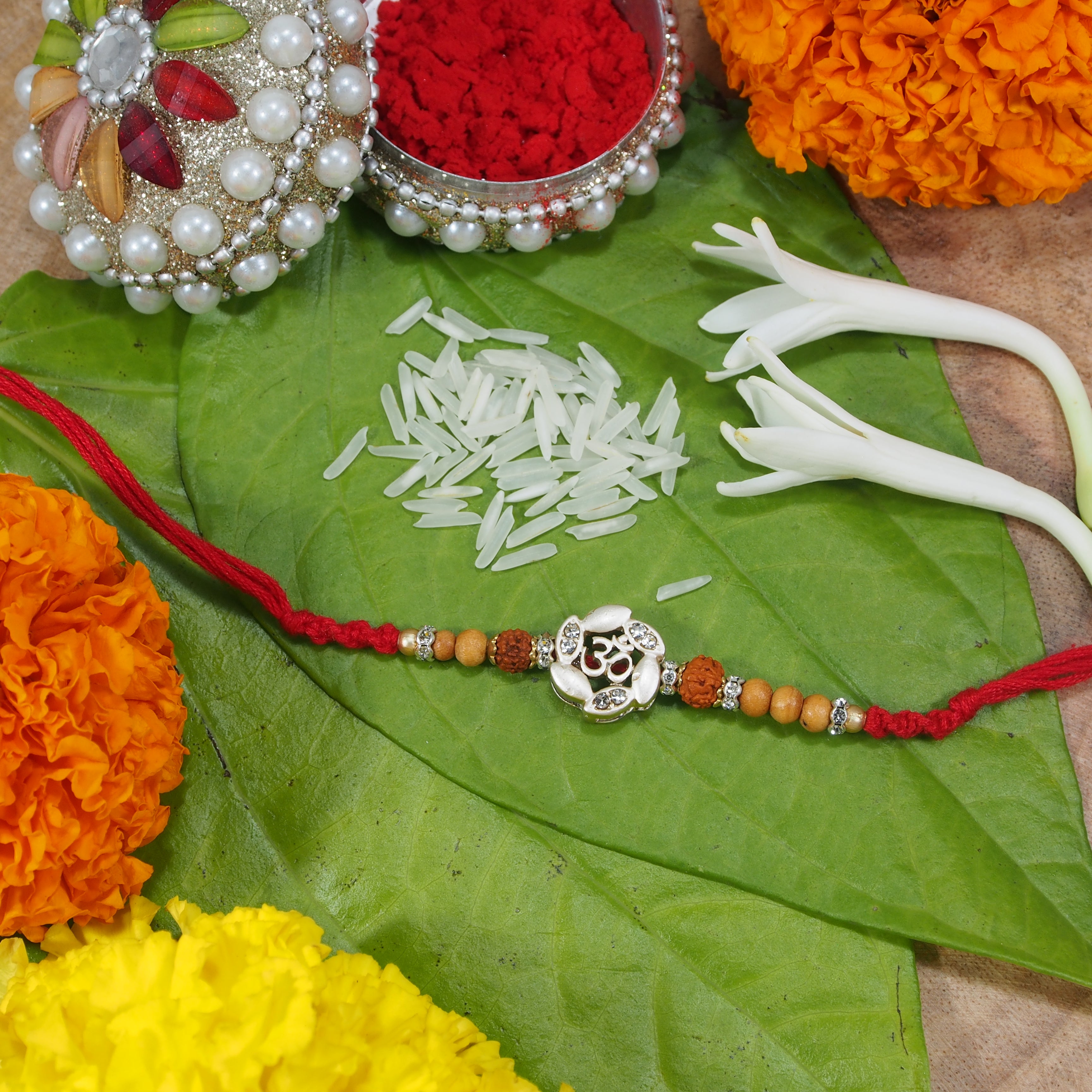 18k Rhodium Plated Ethnic Designer Lord Ganesha Rakhi with Roli Chawal