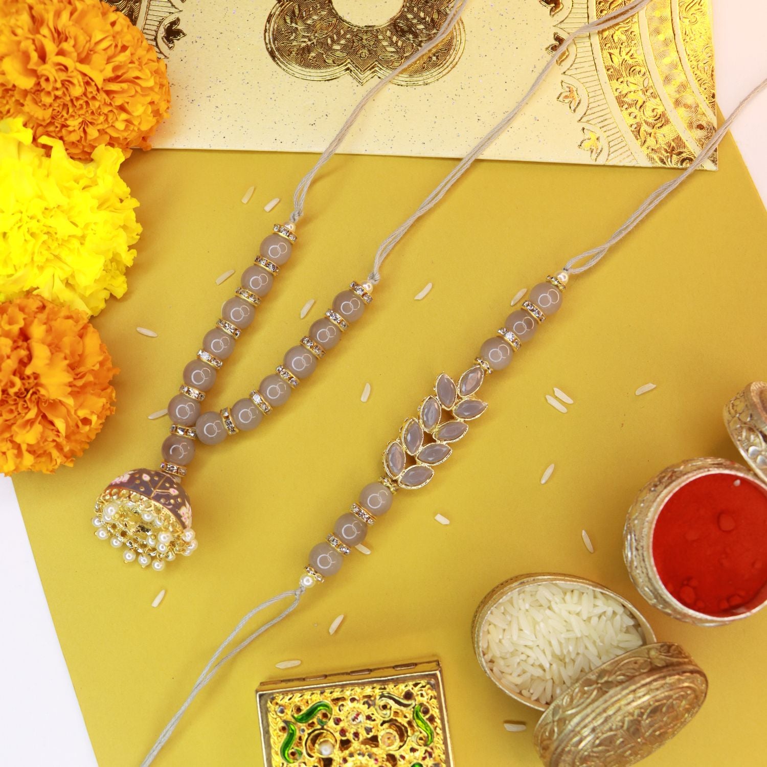 Designer Bhaiya Bhabhi Hanging Lumba & Rakhi Combo Set