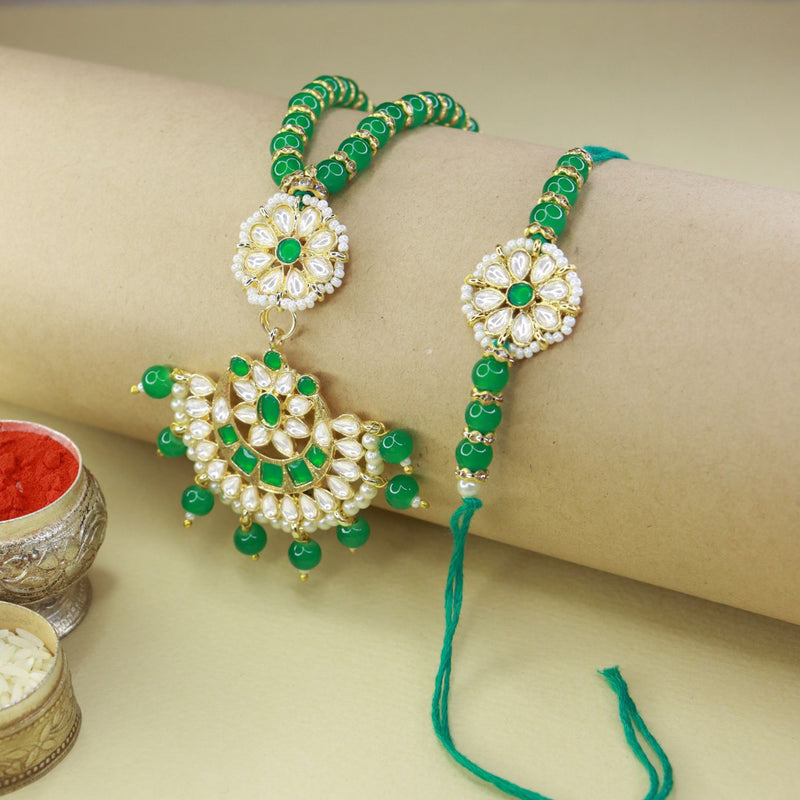 meenakri , kundan , pearls ,stones ,lumba rakhi