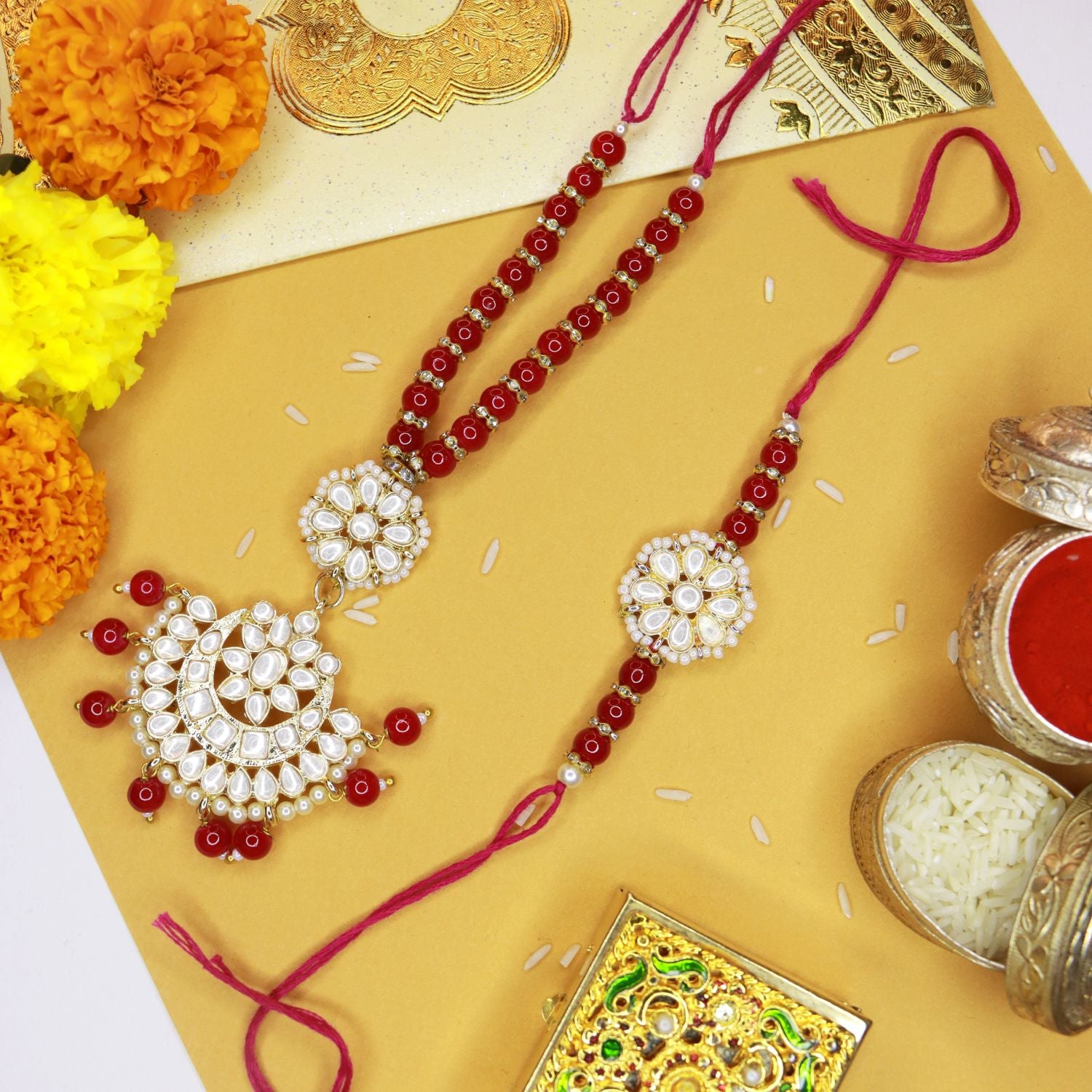 Designer Bhaiya Bhabhi Hanging Lumba & Rakhi Combo Set