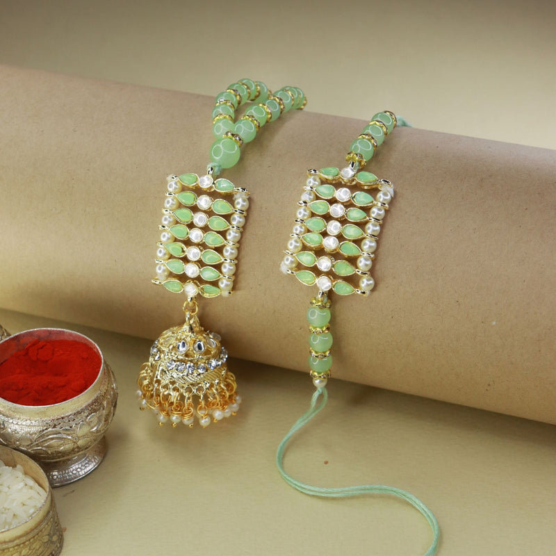  kundan , pearls ,stones ,lumba rakhi