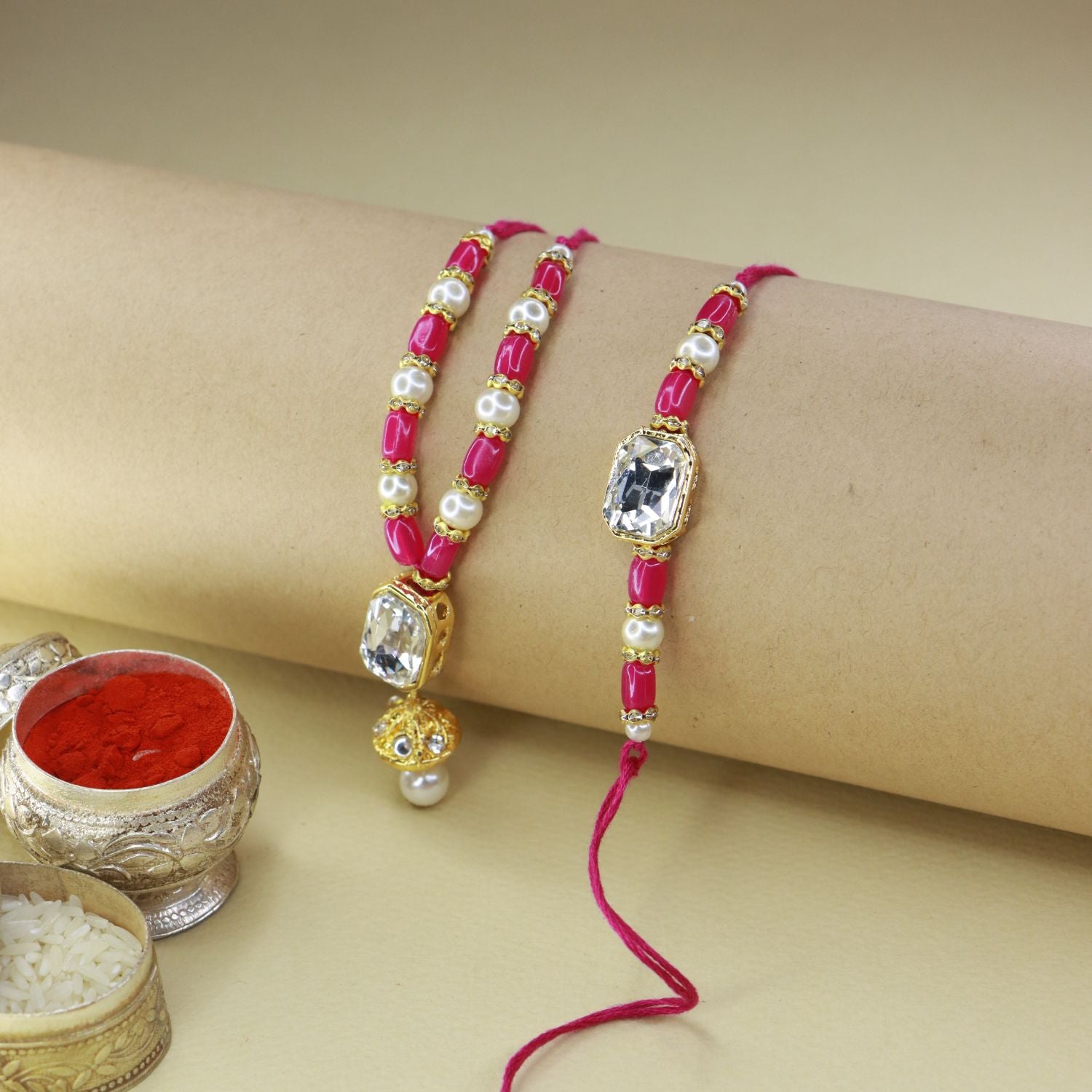 kundan , pearls ,stones ,lumba rakhi