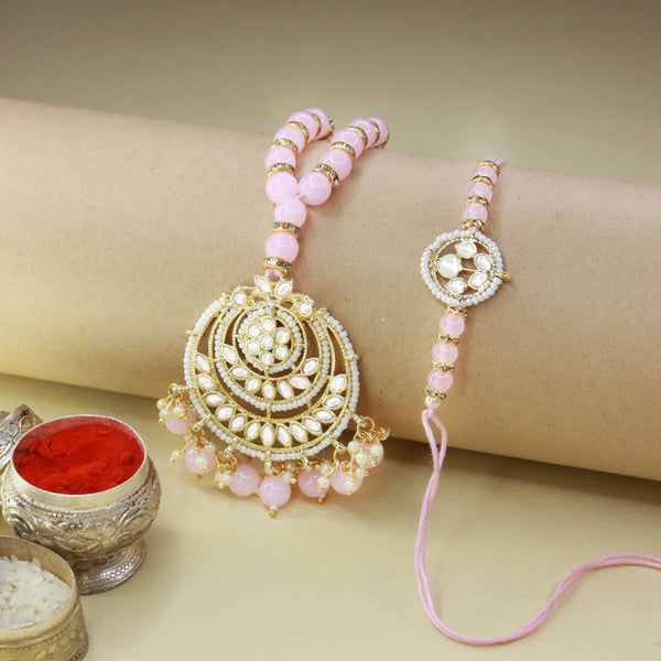kundan , pearls ,stones ,lumba rakhi